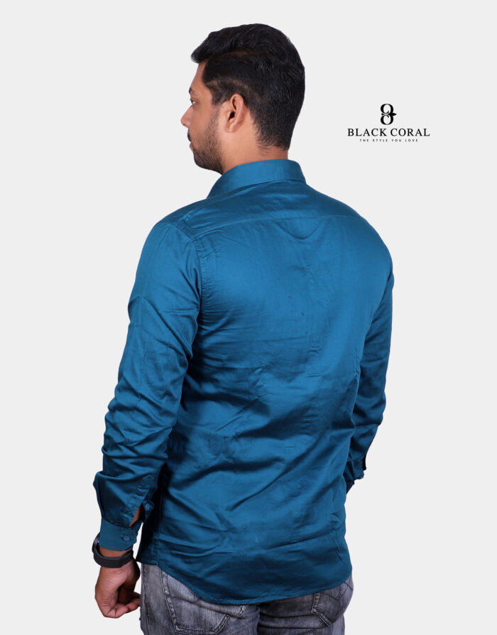 Men’s Peacock Green Slim Fit Solid Full Sleeves Casual Shirt displayed on a mannequin against a neutral background.