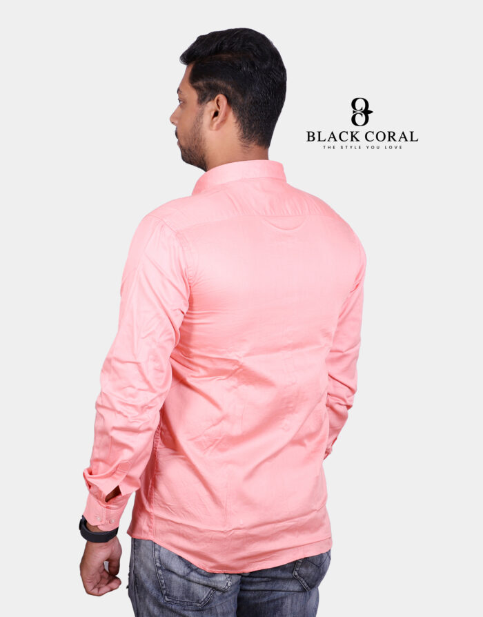 Men's peach slim fit solid full sleeves casual shirt displayed on a hanger against a neutral background.