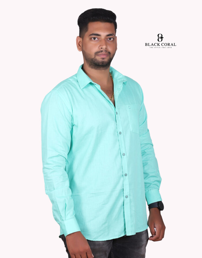 Men’s mint green slim fit solid full sleeves casual shirt displayed on a hanger.
