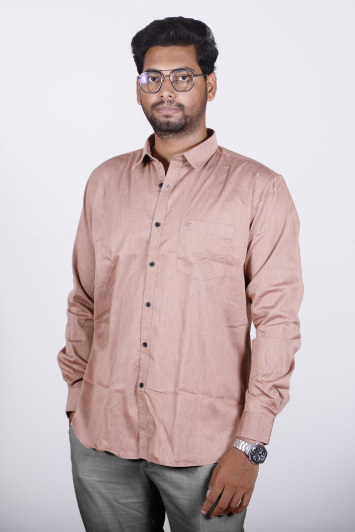 Men’s Alloy Orange Relax Fit Solid Full Sleeves Casual Shirt displayed on a mannequin against a neutral background.