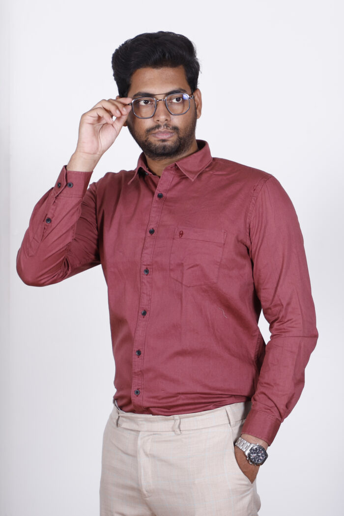 Men's red slim fit solid full sleeves formal shirt displayed on a hanger