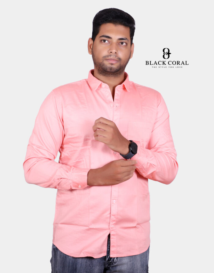 Men's peach slim fit solid full sleeves casual shirt displayed on a hanger against a neutral background.