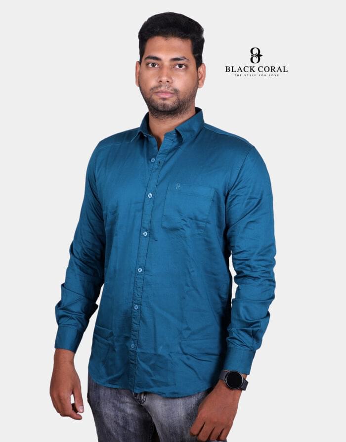 Men’s Peacock Green Slim Fit Solid Full Sleeves Casual Shirt displayed on a mannequin against a neutral background.
